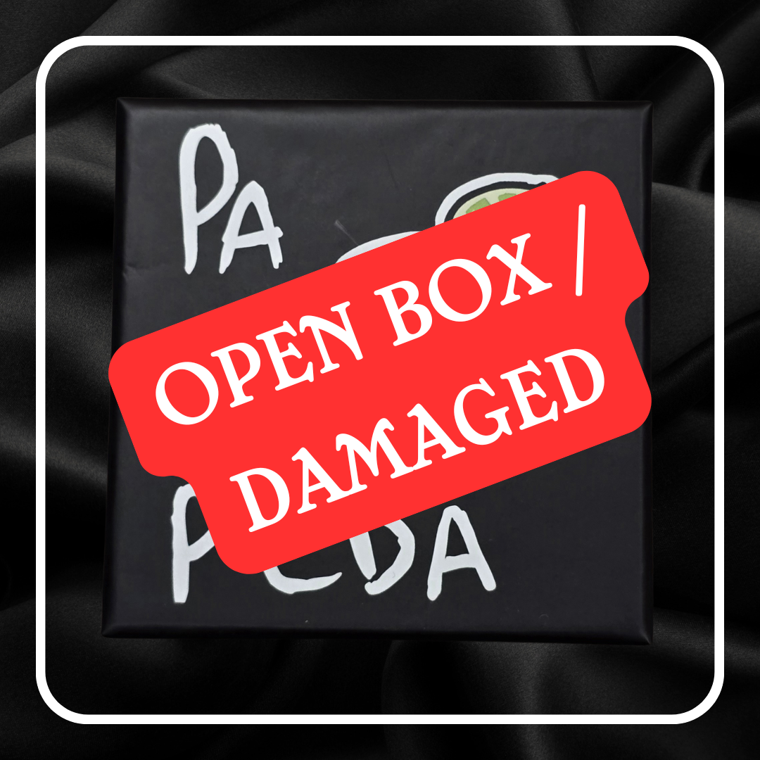 Black box with 'Open Box | Damaged' label on a dark background