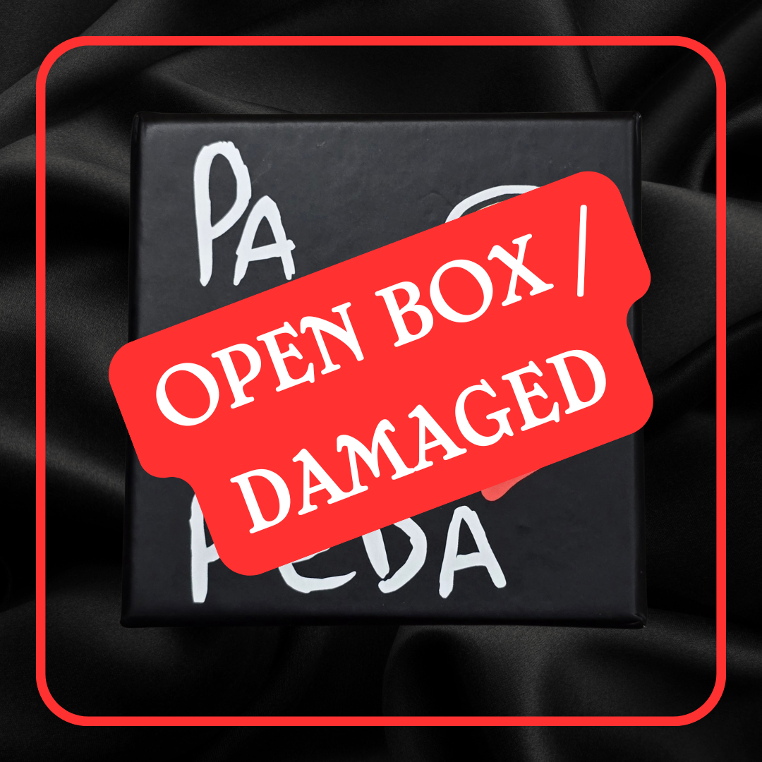 Black box with 'Open Box | Damaged' label on a black background