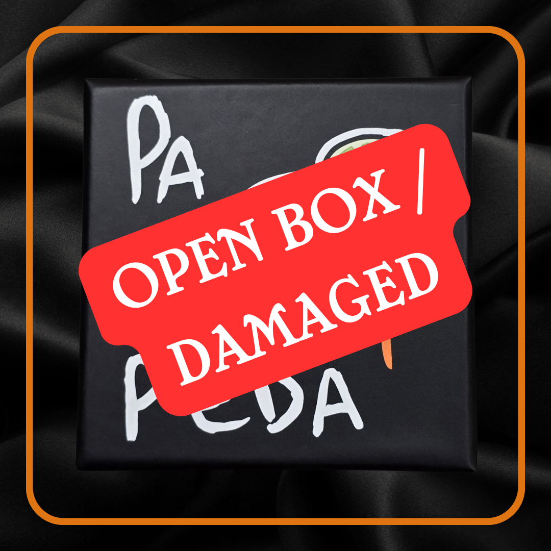 Black box with 'Open Box | Damaged' label on a dark background