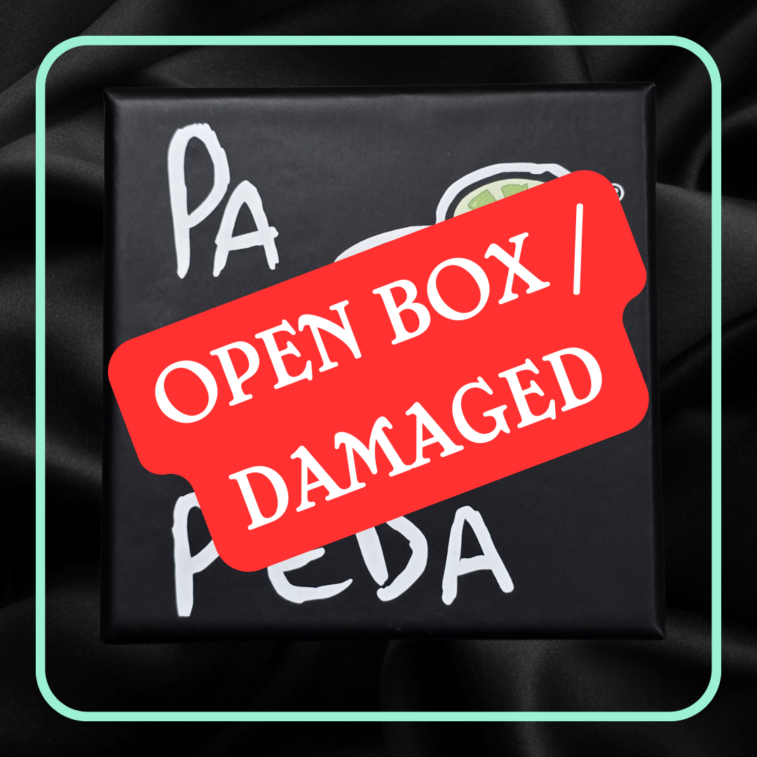 Black box with 'Open Box / Damaged' label on a dark background