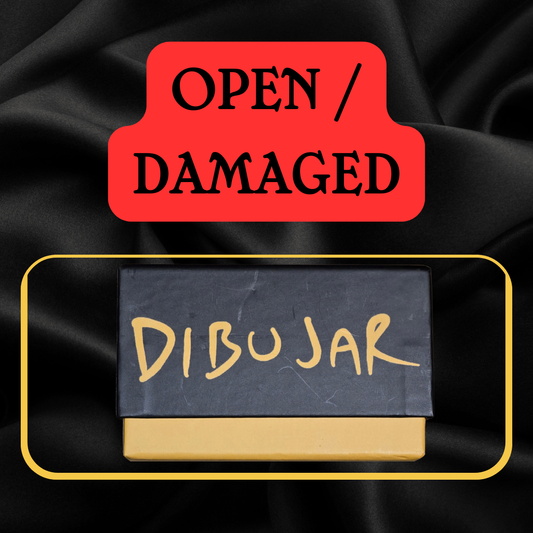 Red 'Open/Damaged' label on black fabric with 'DIBUJAR' written on a game