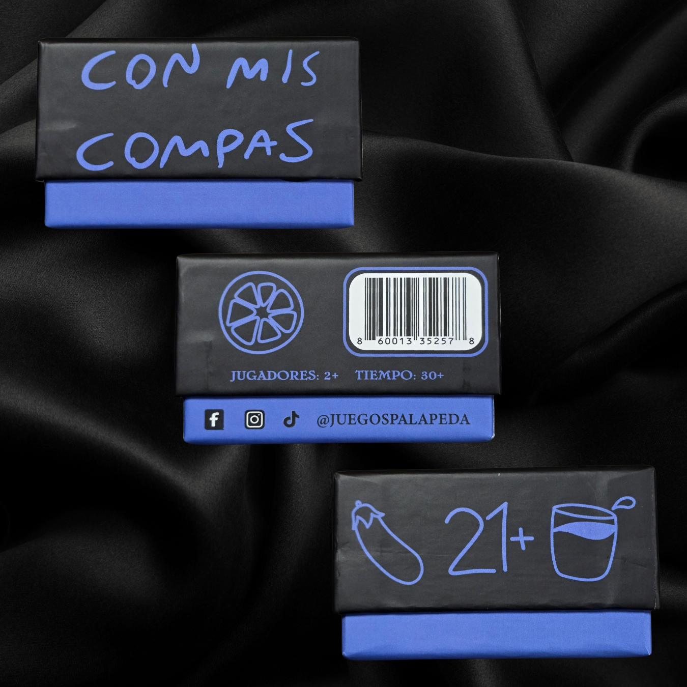 Black game box with blue text and graphics on a black fabric background