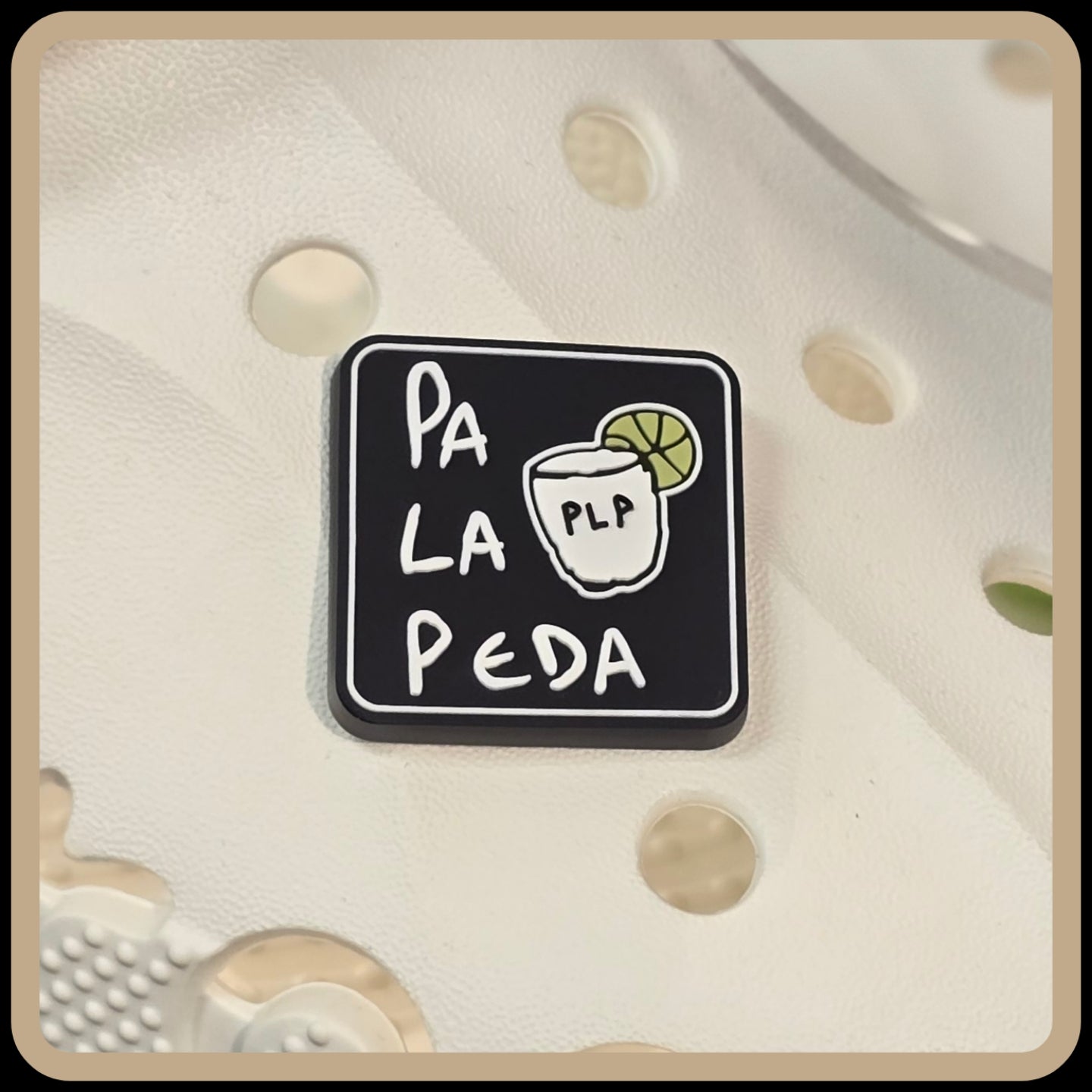 Square sticker with 'Pa La Peda' text and a drink illustration on a textured beige background