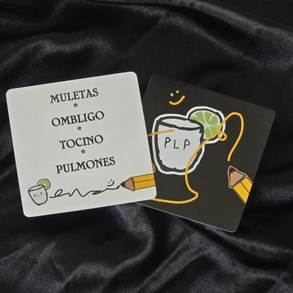 Two cards with illustrations and text on a dark fabric background