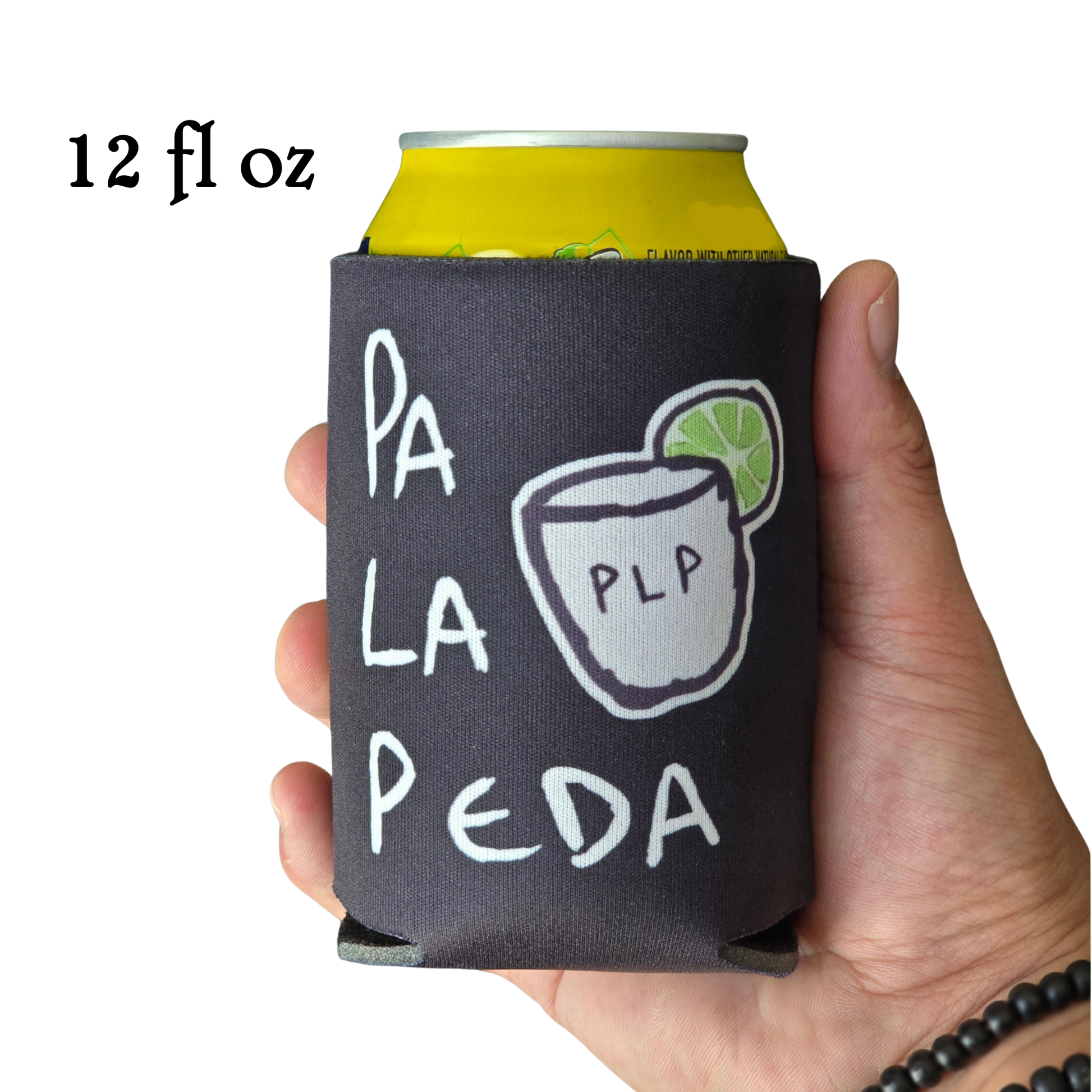 Hand holding a can with a 'Pala Peda' design on a white background